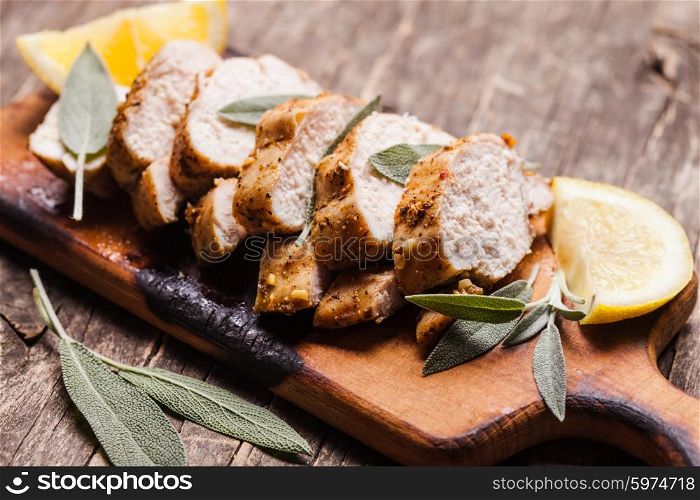 Spicy baked chicken breast with sage and lemon. baked chicken breast
