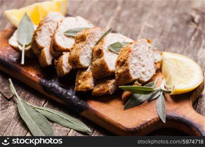 Spicy baked chicken breast with sage and lemon. baked chicken breast