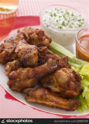 Spicy Buffalo Wings with Blue Cheese Dip Celery and Hot Chilli Sauce
