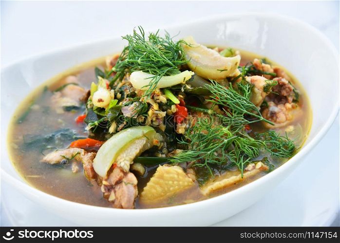 Spicy chicken curry soup bowl with spices herb and vegetable - Thai style food