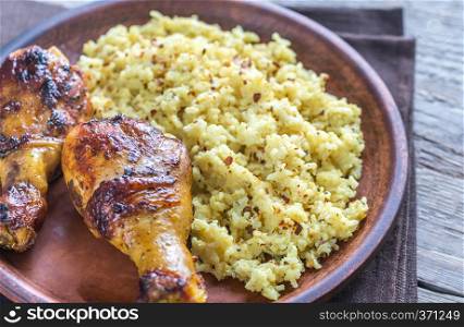 Spicy chicken drumsticks with rice curry