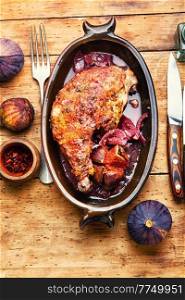 Spicy chicken leg roasted with autumn figs. Chicken baked with figs