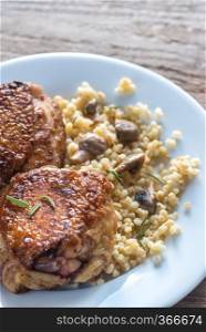 Spicy chicken with bulgur and mushrooms