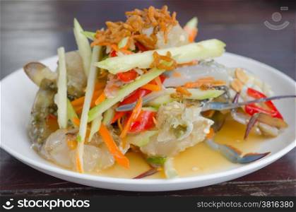 spicy mango salad with crab , asian style food