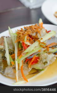 spicy mango salad with crab , asian style food