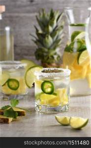 Spicy Margarita. Tequila Infused on Slices of Fresh Pineapple, Lime, hot jalapeno