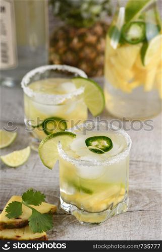 Spicy Margarita. Tequila Infused on Slices of Fresh Pineapple, Lime, hot jalapeno