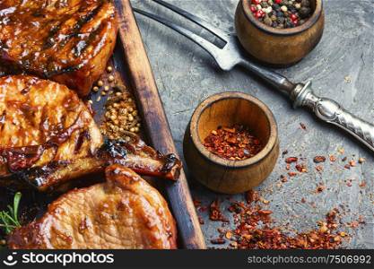 Spicy meat grilled spare ribs on wooden cutting board.Pork rack grilled. Pork ribs grilled