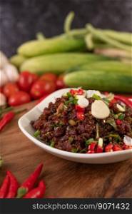 Spicy minced meat, made from raw meat with chili peppers. garlic and spring onions.