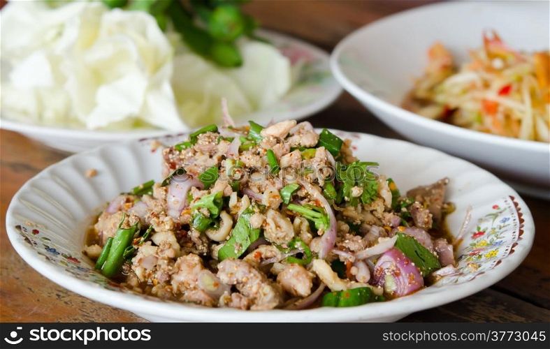 spicy minced pork with vegetable on dish