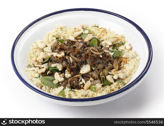 Spicy Moroccan style minced beef served with couscous mixed with chopped herbs and dried apricots, garnished with toasted cashew nuts and almond slivers and topped off with fried onions.