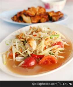 spicy papaya salad and roasting chicken (Thai style food)