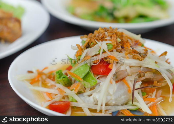 spicy papaya salad with crab , asian spicy food