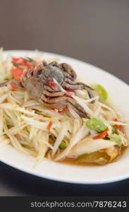 spicy papaya salad with crab on dish , asian spicy food