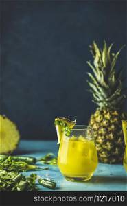 Spicy pineapple jalapeno mezcalita or margarita for Cinco de Mayo is a refreshing cocktail made with pineapple, cilantro, jalapeno and mexican distilled alcoholic beverage.
