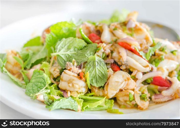 spicy salad. asian spicy salad with seafood and vegetables