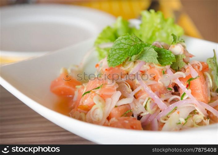 spicy salmon salad. close up of spicy salmon salad with mixed vegetable