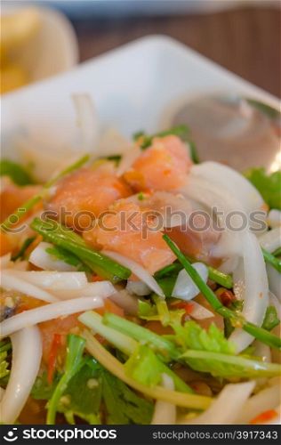 Spicy salmon salad . Spicy salmon salad with mixed vegetable and herb
