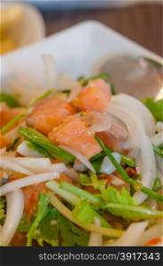 Spicy salmon salad . Spicy salmon salad with mixed vegetable and herb