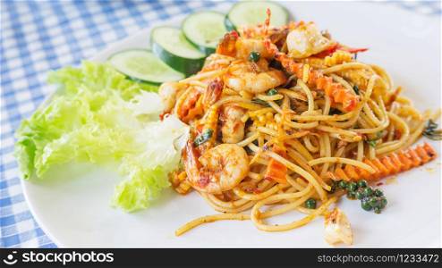spicy stir-fried spaghetti with prawn, (Thai food).