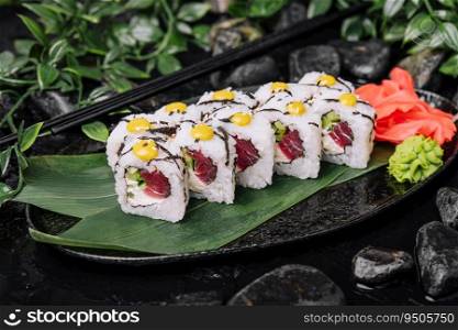 Spicy tuna maki rolls on plate