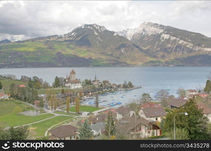 Spiez town with the castle on lake Thun (Jungfrau region, canton Bern, Switzerland)