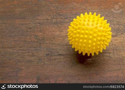 spiky rubber ball roller for self massage, reflexology and myofascial release