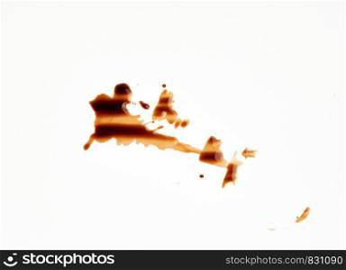 spilled black coffee on white paper, abstract stains, close up