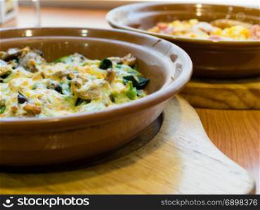 Spinach and mushroom in melted cheese
