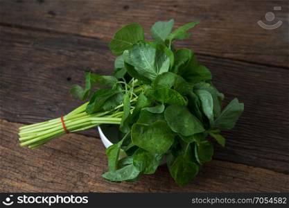spinach on wooden table