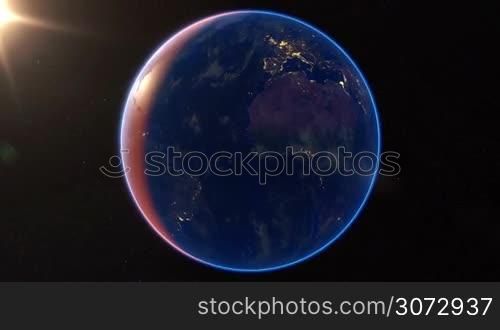 Spining Earth and zoom in. Planet Earth rotates. Extremely detailed image, including elements furnished by NASA.