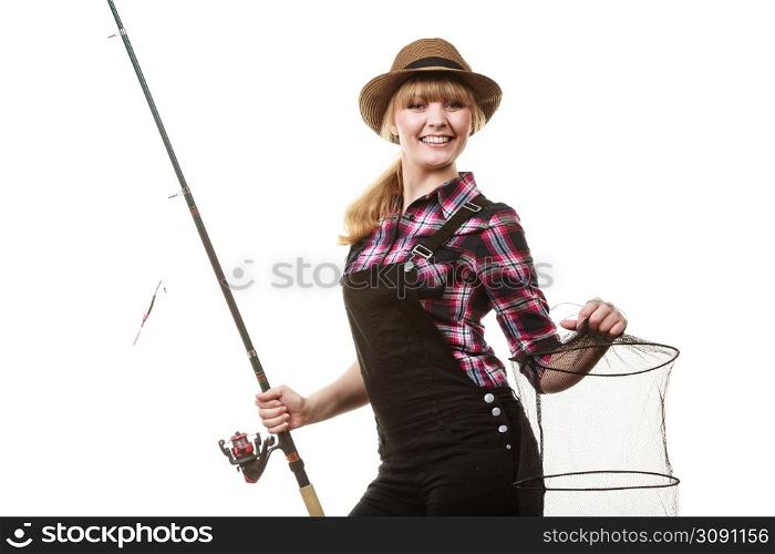 Spinning, angling, cheerful fisherwoman concept. Happy woman in sun hat holding fishing rod and keepnet having fun.. Happy woman holding fishing rod and keepnet