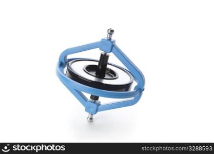 Spinning gyroscope on white background
