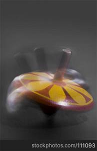 spinning top. spinning top, rotation, speed, color, wooden toy, blur, vitage toy, conceptual,