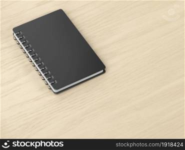 Spiral notebook on wooden desk