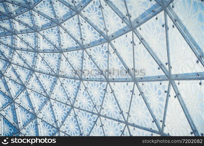 Spiral of construction architecture structure. Glass facade design of Sheikh Zayed Grand Mosque Center, Abu Dhabi, United Arab Emirates or UAE. Illusion background.