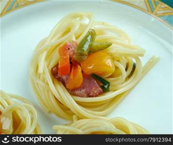 spiral squash spaghetti noodles with sausage and vegetable sauce .