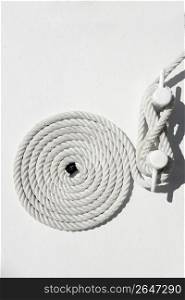 spiral white sea nautical rope on sailboat boat mooring