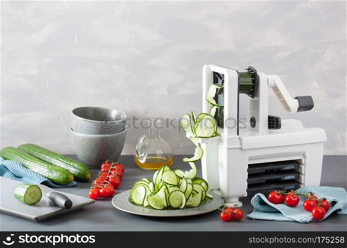 spiralizing cucumber vegetable with spiralizer