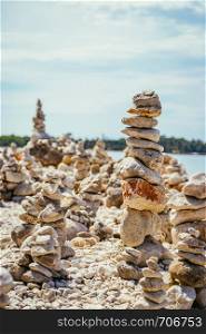 Spiritual cairns at the coast of Croatia, ocean