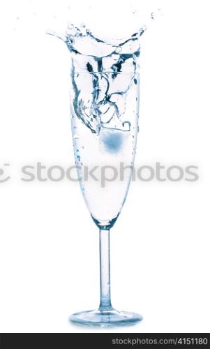 splash in water glass isolated on white