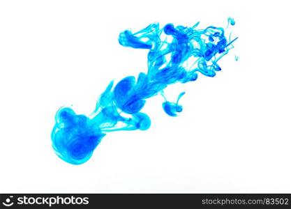 Splash of blue ink in water isolated on white background