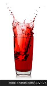 Splash of cherry juice in a glass with an ice cube isolated on a white background. Splash of cherry juice in glass with an ice cube