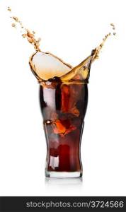 Splash of cola in a glass isolated on a white background