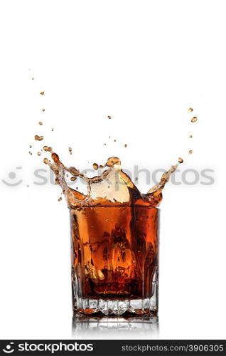 splash of cola in glass isolated on white