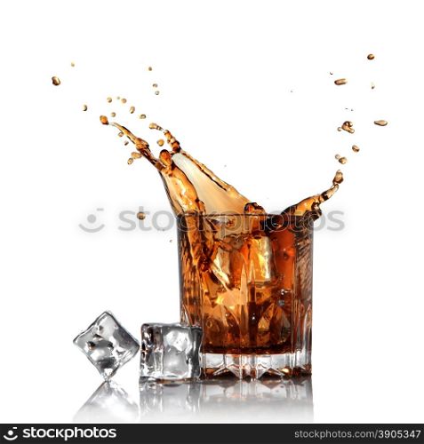 splash of cola in glass with ice cubes isolated on white
