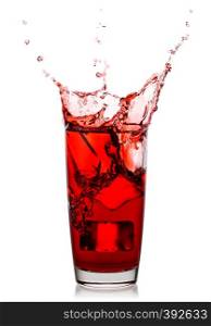 Splash of fresh natural cherry juice in a glass isolated on a white background. Splash of fresh natural cherry juice in glass