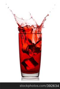 Splash of gorgeous cherry juice in a glass with ice cubes isolated on white background. Splash of gorgeous cherry juice in glass with ice cubes