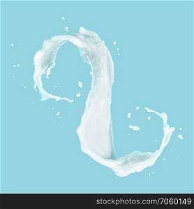 Splash of white fat milk as design element on blue background. Splash of white fat milk