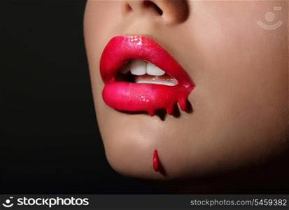Splash. Woman&#39;s Red Lips with Dripping Lipstick. Creativity